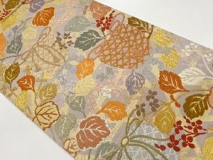 唐織草花に虫籠模様織出し袋帯